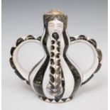 Jug; Triana, 16th century.Ceramic.Measurements: 34.5 x 33 x 35 cm.Vase with four handles made of