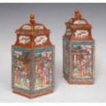 Pair of lidded rhomboid vases; China, Jiaping period (1796-1820).Porcelain, pink family.