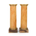 Pair of columns-peana pps s.XIX.Polychrome wood emulating marble and gilded details.Measurements: