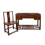 Set of desk and chair. China, 19th century.Tropical wood.Measurements: 88 x 125 x 55.5 cm (table);