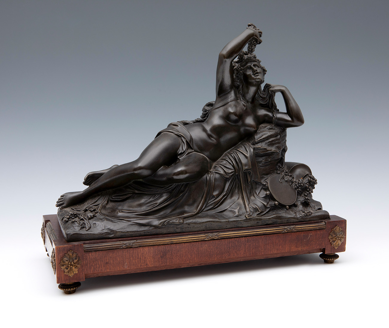 French or Italian school, mid-19th century."Allegory of Autumn".Patinated bronze. Wooden base.