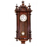 Early 20th century wall clock.Wood.Measurements: 86 x 32 x 17 cm.Wall clock made of wood. The