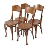 Set of four Jugendstil chairs; Austria, ca. 1900.Wood, decorated with bas-relief motifs.