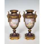 Pair of goblets; Sèvres, late 19th century.Porcelain and bronze.Signed Feccalti.With felling loss (