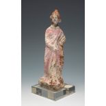 Female figure. Canosa, Magna Graecia, 3rd century BC.Polychrome terracotta.Acquired at Sotheby's