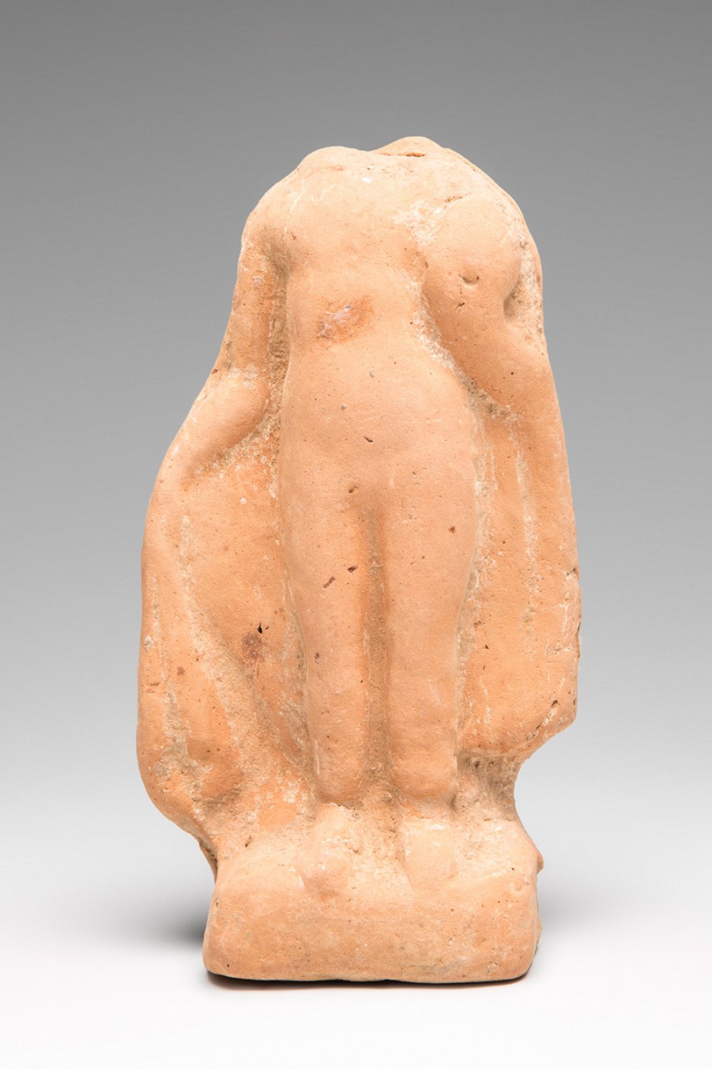 Figure. Greece, 4th-2nd century BC.Terracotta.Size: 11 x 6 x 4 cm.Hellenistic sculpture represents