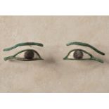 Egyptian eyes from the Late Antique period (712-332 BC).Bronze and inlaid with stones.