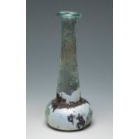 Ointmentary. Rome, 2nd-1st century BC.Glass.In very good condition.Measurements: 15 cm (height).