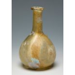 Ointment-bottle. Rome, 1st-2nd century AD.Blown glass. In very good condition. Attached is a