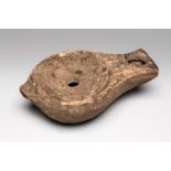 Lucerne. Roman Empire, 2nd-4th century AD.Terracotta.Size: 3 x 9 x 6 cm.Roman lucerne in