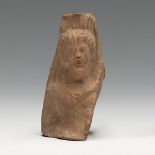 Greek bust. 4th-3rd century BC.Terracotta.Size: 7.5 x 4.5 cm .Terracotta figurines are a mode of