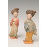 Pair of "fat ladies"; China, Tang Dynasty, AD 618-907.Polychrome terracotta.Attached is a