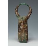 Double ointment. Rome, 3rd-4th century AD.Glass with iridescence.Whole. Very good state of