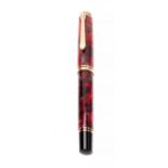 PELIKAN SOUVERÄN 600 RUBY RED FOUNTAIN PEN.Barrel in red resin.M nib in 18 kts. gold and 750 ml