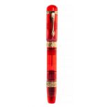 ANCORA DEMONSTRATOR FIRE FOUNTAIN PEN.Body in red ebonite and details in 18kt yellow gold.Limited
