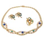 18kt yellow gold setting. lapis and turquoise. Composed of choker ring and earrings, in 18 kts.