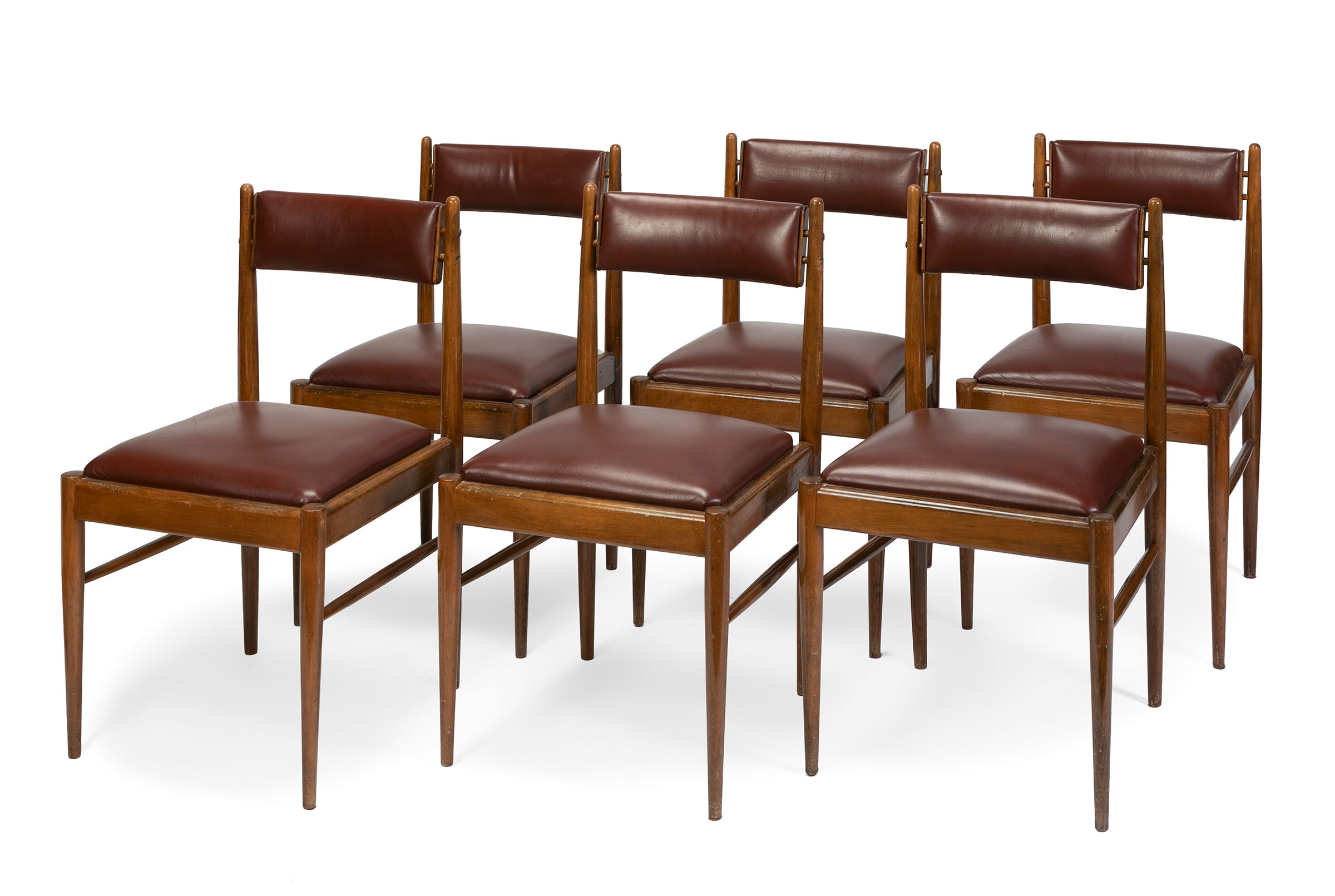 Set of six chairs, 1950s-60s.Beech wood frame and leather upholstery.In need of refinishing.