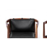ILLUM WIKKELSO (Denmark, 1919 - 1999).Pair of armchairs, ca. 1960.Rosewood and black leather.Wear