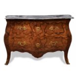 Commode; Louis XV, France, mid-18th century.Rosewood.Presents a 19th century envelope.