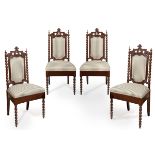 Set of four alfonsino chairs; Spain, early 20th century.Carved oak or walnut wood and silk covered