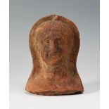 Etruscan votive head, ca. 4th century BC.Terracotta.Conservation: in good condition.Provenance: