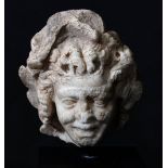 Satyr's head; Rome, c. 1st-2nd century AD.Marble.Size: 12 x 6 cm.The facial features reveal an