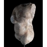 Torso of a child. Ancient Rome, ca. 3rd century AD.Marble.The right arm is damaged and has soil