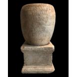 Funerary urn; Roman culture, 1st century AD.MarbleWith inscription.It shows wear due to erosion of