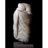 Fragmentary figure of Leda and the swan. Ancient Rome, ca. 1st-2nd century AD.Marble.In good