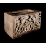 Cinerary urn with a wrestling scene. Etruscan, 4th-3rd century BC.Terracotta.The lid is missing. The