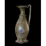 Large jug. Ancient Rome, ca.200-300 AD.Glass.In good condition. It shows iridescence and soil