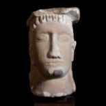 Male bust; Cyprus, 5th century BC.Limestone.It has a break in the bridge of the nose, slight