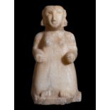 Female figure; South Arabia; c. 3rd-1st century BC.Alabaster.With losses in the lower area.