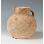 Jug from Roman culture, 1st-2nd century AD.Clay, lathe and firing.Size: 17.5 x 12 cm.Globular-