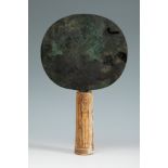 Ancient Egyptian Mirror. Late Antique, 664-323 BC.Bronze and bone.Provenance: Private collection,