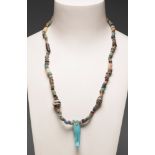 Egyptian necklace from the Ptolemaic period (320 to 30 BC).Fired clay and vitreous paste in