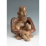Figure of a musician with a scraper or Omichicahuaztli; Jalisco, Western Mexico; 250 BC-100 AD.