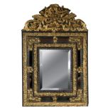 Louis XIII style mirror; France, XIX century. Ebonized wood and brass applications.