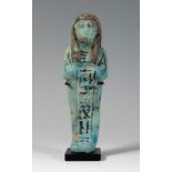 Ushebti of the Egyptian nobleman, Mayor Pay, New Empire, 1526-1070 BC.Blue-greenish faience.