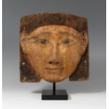 Funerary mask; Egypt, Late Antiquity, 66-332 BC.Polychrome sycamore wood.Damage due to the passage