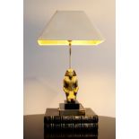 Pharaoh table lamp, Hollywood Regency style, 1970s.Brass and bronze. The piece will be available
