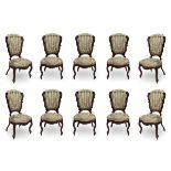 Set of ten Elizabethan chairs, ca. 1850.In carved mahogany and silk upholstery.Measurements: 105 x