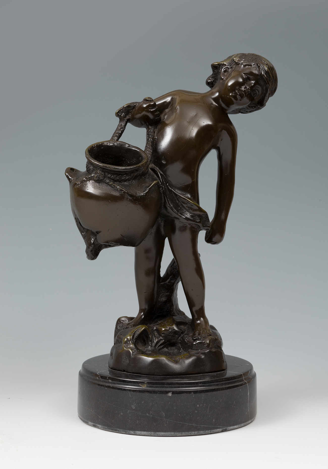 AUGUSTE MOREAU (France, 1834 - 1917)."Boy with a Pitcher".Bronze.Signed.Size: 24 cm (height); 4
