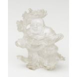 Buddha sculpture; China, ca. 1950.Rock crystal.Size: 14 x 12 x 6 cm.The figure represents a Buddha