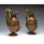 Pair of Art Nouveau jugs, early 20th century.Calamine.Measurements: 34 x 16 cm (diameter).Pair of