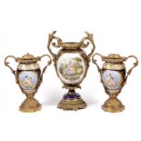 Three Old Paris vases; France, last third of the 19th century.Enamelled porcelain and bronze.