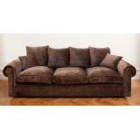 Sofa of 20th century design.Brown velvet upholstery and nailed decoration.In good state of