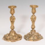 Pair of Louis XV style candlesticks; France, late 19th century.Bronze.Measurements: 29 x 16 cm.