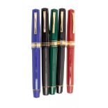 OMAS PARAGON FOUNTAIN PENS.Barrel in coloured resins.Three 18 Kts gold nibs, nibs F, M and M; and