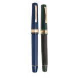 OMAS PARAGON FOUNTAIN PENS "ITALIA 90".Blue and green resin barrels.Nib in 18 Kts gold, tip F.